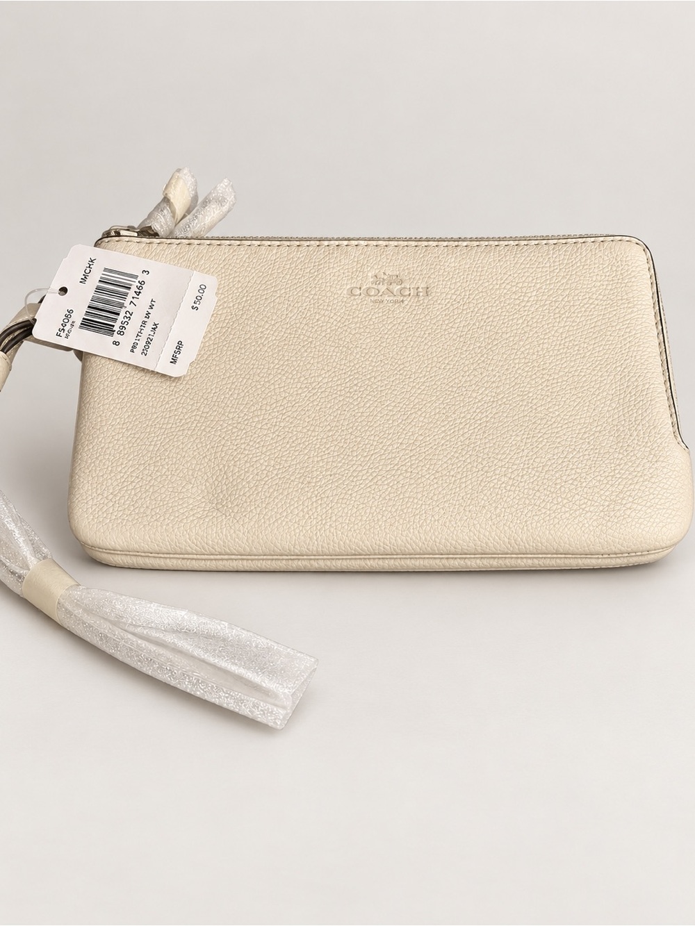 Coach Pebbled Leather Wristlet in Light Ivory